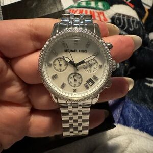 Michael kors watch with noticeable scratches